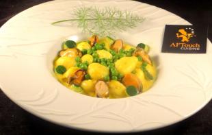 Gnocchi moules et petits pois en safrane