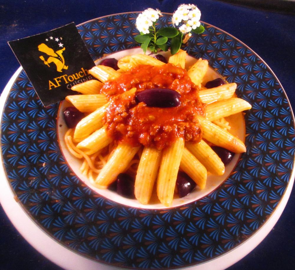 Penne rigate en bolognaise de canard mulard